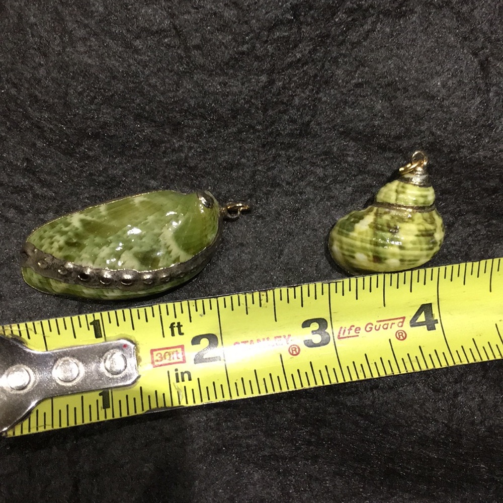 Pair of green shell necklaces outlined in gold